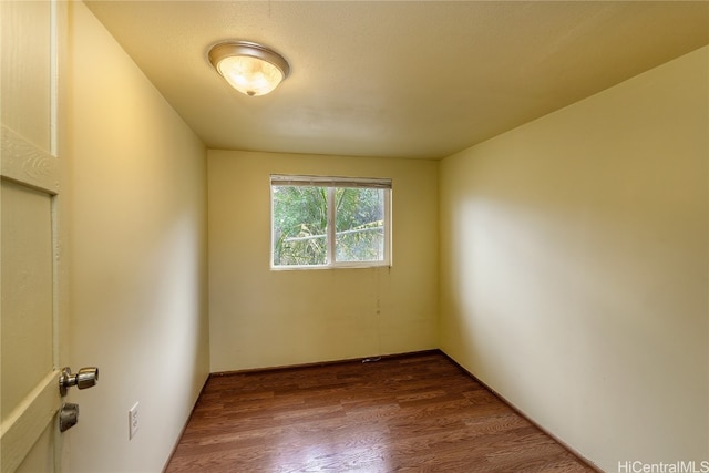 empty room featuring hardwood / wood-style floors