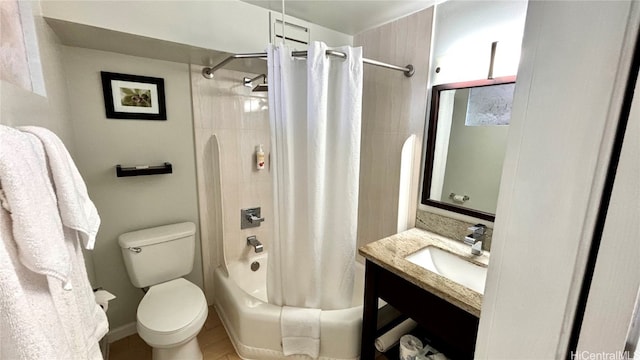 full bathroom featuring toilet, shower / bathtub combination with curtain, and vanity