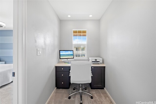 home office with light carpet