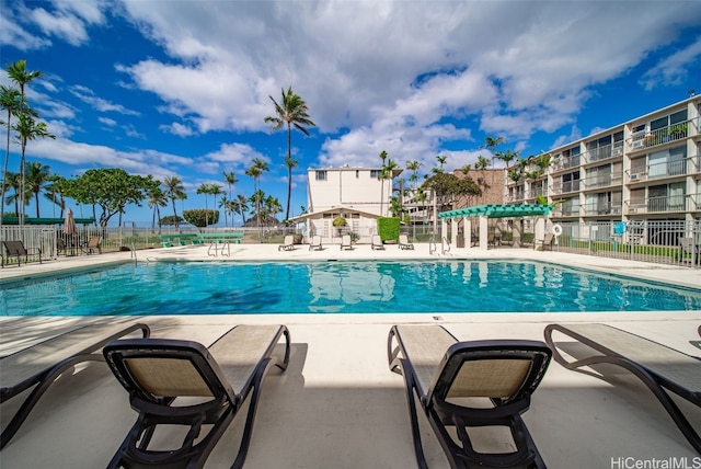 view of swimming pool featuring a patio