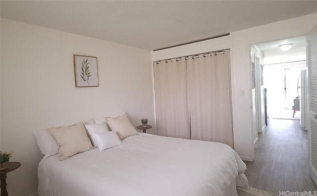 bedroom featuring hardwood / wood-style flooring