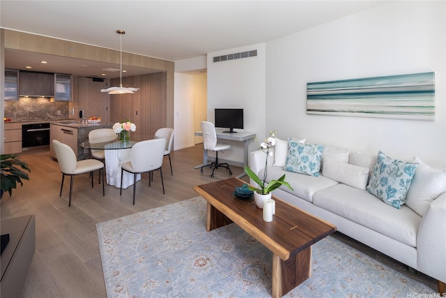 living area featuring light wood-style floors