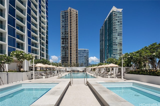 view of swimming pool featuring a patio area