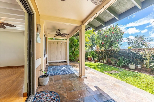 view of patio with ceiling fan and a fenced backyard