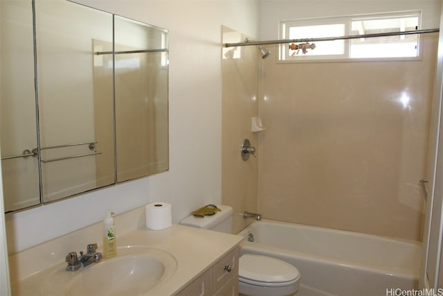 full bathroom featuring  shower combination, vanity, and toilet