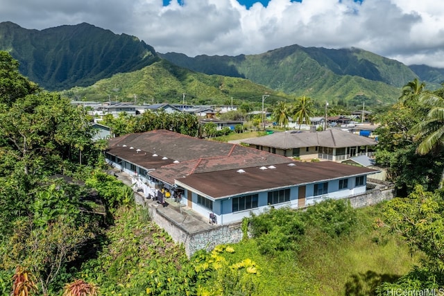 birds eye view of property featuring a mountain view