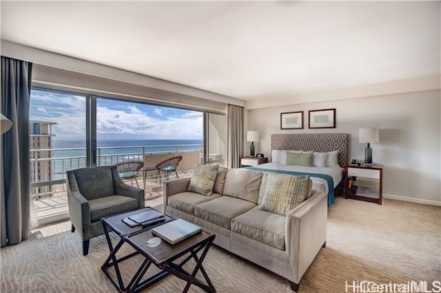 1777 Ala Moana Blvd Unit 2218, Honolulu, HI 96815 - bedroom featuring light carpet, access to outside, a water view, and multiple windows