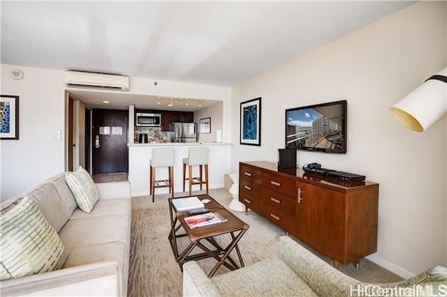 1777 Ala Moana Blvd Unit 2218, Honolulu, HI 96815 - living room with track lighting, a wall unit AC, and light carpet