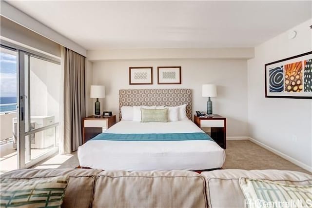 1777 Ala Moana Blvd Unit 2218, Honolulu, HI 96815 - carpeted bedroom featuring baseboards and access to exterior