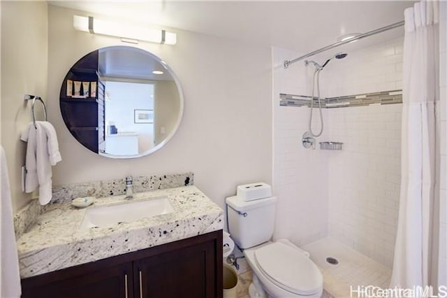 1777 Ala Moana Blvd Unit 2218, Honolulu, HI 96815 - bathroom with vanity, toilet, and a stall shower