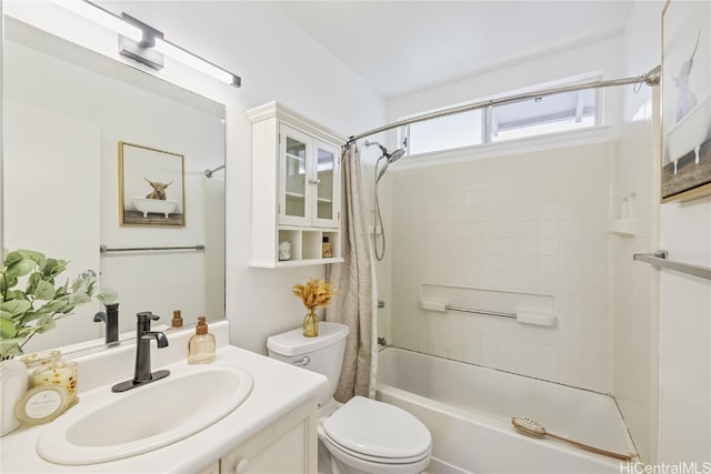 full bathroom featuring bathing tub / shower combination, vanity, and toilet