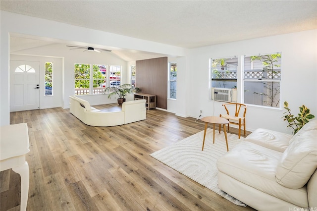 91-1019 Hiluhilu St, Kapolei, HI 96707 - living room featuring wood finished floors, a ceiling fan, and cooling unit