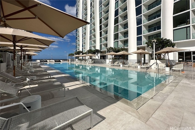 view of pool featuring a patio