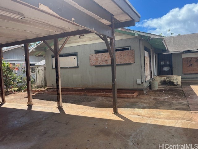 view of patio / terrace with a carport