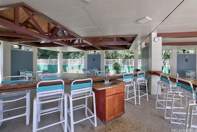 view of patio featuring a gazebo and a wet bar