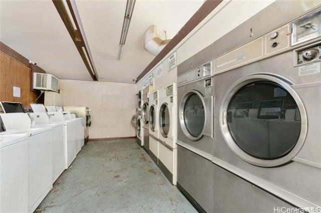 laundry area with washing machine and clothes dryer