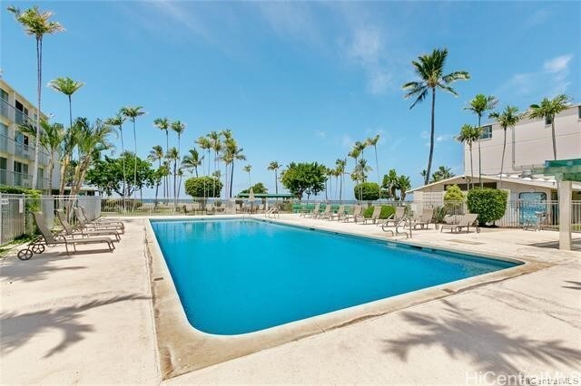 view of swimming pool with a patio