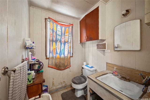 91-669 Pohakupuna Rd, Ewa Beach, HI 96706 - bathroom with toilet, tile patterned floors, wood walls, and vanity