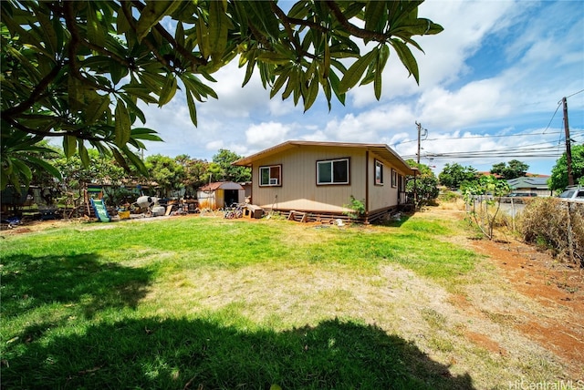 exterior space featuring a shed