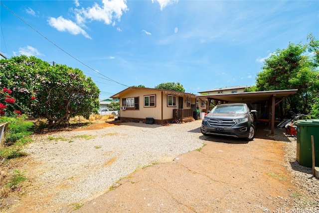 view of front of house featuring a carport