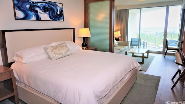 bedroom featuring hardwood / wood-style flooring