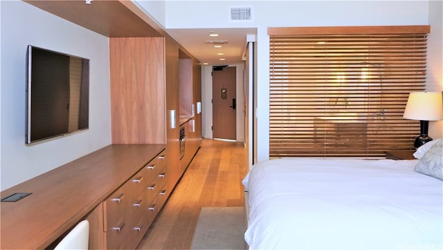 bedroom featuring light hardwood / wood-style floors