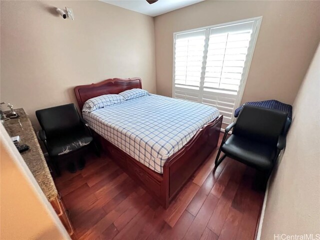 bedroom featuring hardwood / wood-style floors