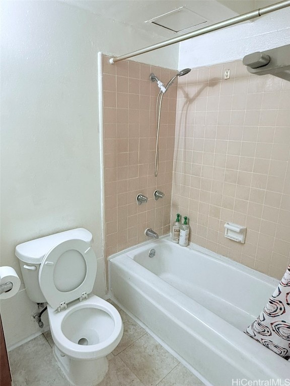 bathroom with toilet, tile patterned floors, and shower / bathtub combination with curtain