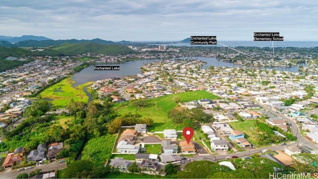 bird's eye view featuring a water and mountain view