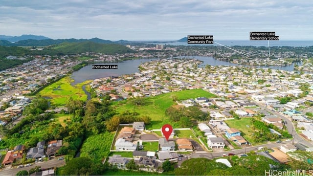 aerial view with a water and mountain view