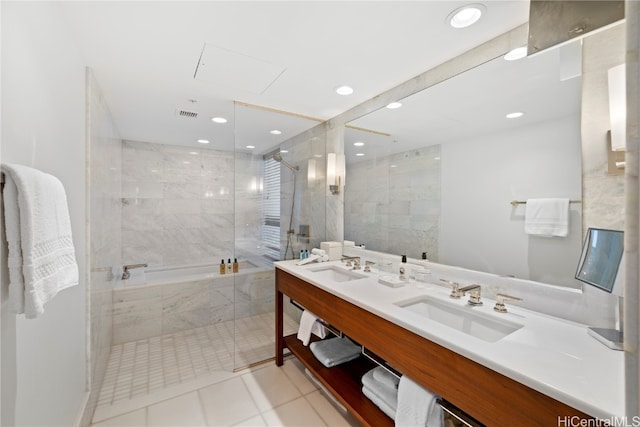 bathroom featuring vanity, tile patterned floors, and separate shower and tub