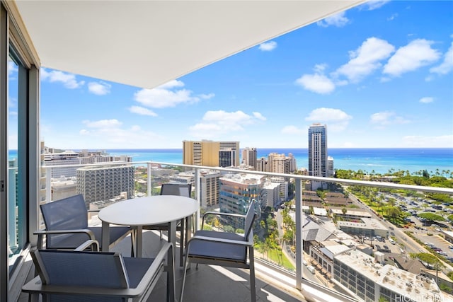 balcony featuring a water view