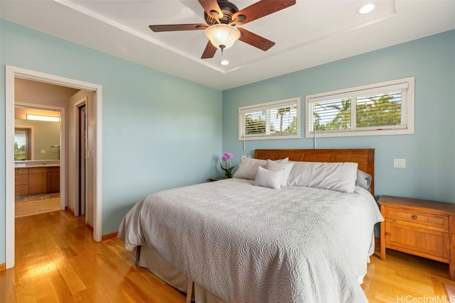 bedroom featuring light wood-type flooring, recessed lighting, a ceiling fan, and baseboards