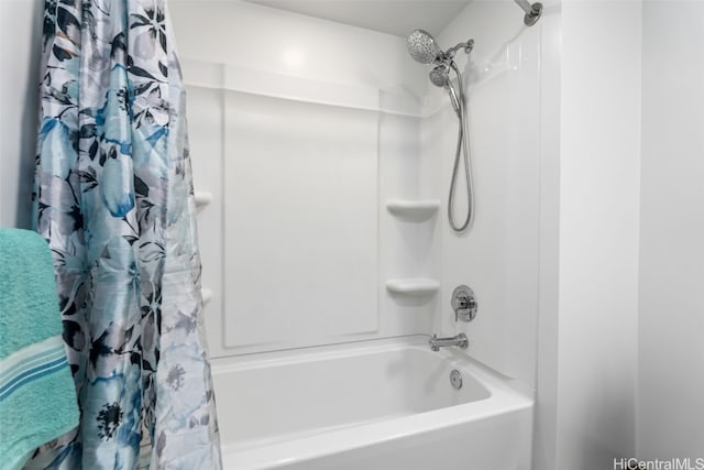 bathroom with shower / tub combo