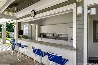 kitchen with white cabinets