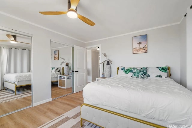 bedroom with ornamental molding, wood-type flooring, and ceiling fan