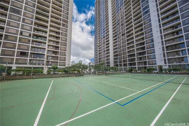 view of tennis court with basketball court