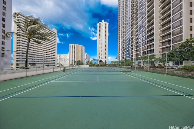 view of tennis court with basketball court