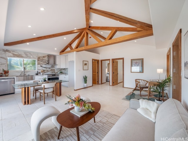 tiled living room with beamed ceiling and high vaulted ceiling