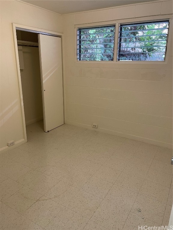 unfurnished bedroom featuring a closet