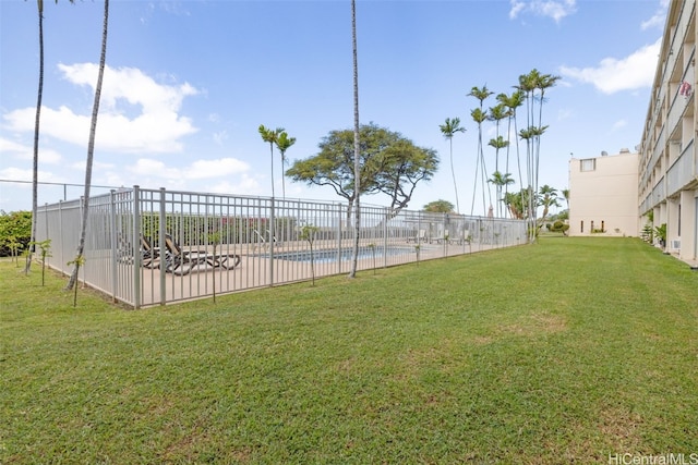 view of yard with a patio and a community pool