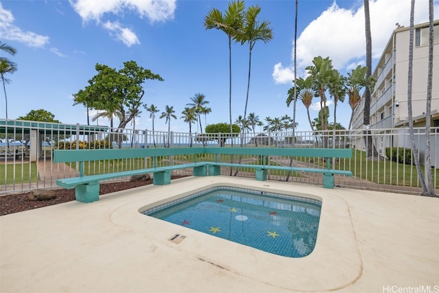 view of swimming pool with a patio area