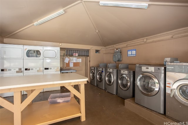 laundry area with stacked washer / dryer and washing machine and clothes dryer