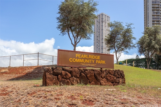 community sign with a lawn