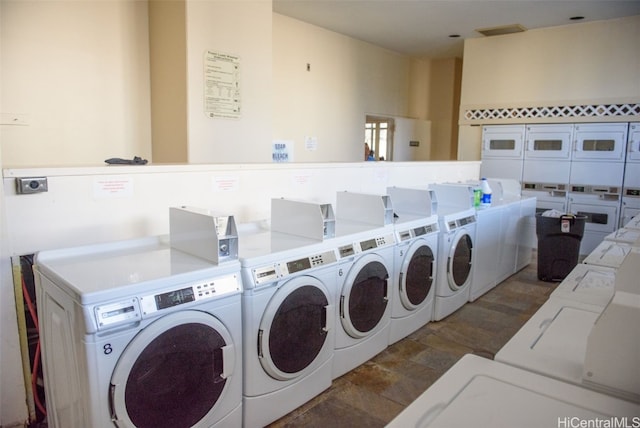 laundry room featuring separate washer and dryer