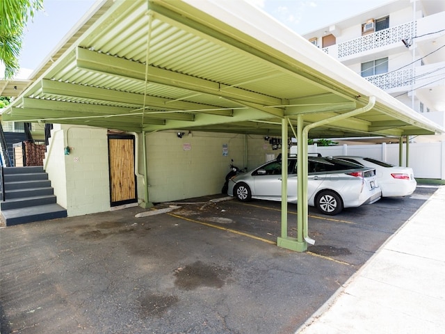 view of parking with a carport