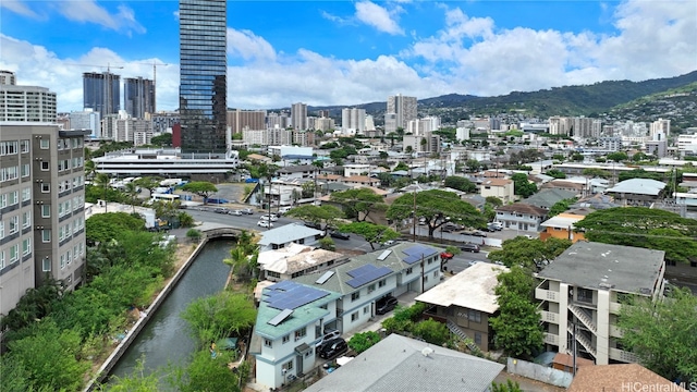 birds eye view of property featuring a mountain view