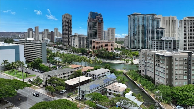 property's view of city featuring a water view