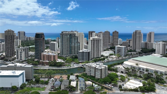 property's view of city with a water view