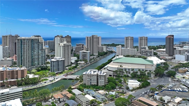 birds eye view of property featuring a water view